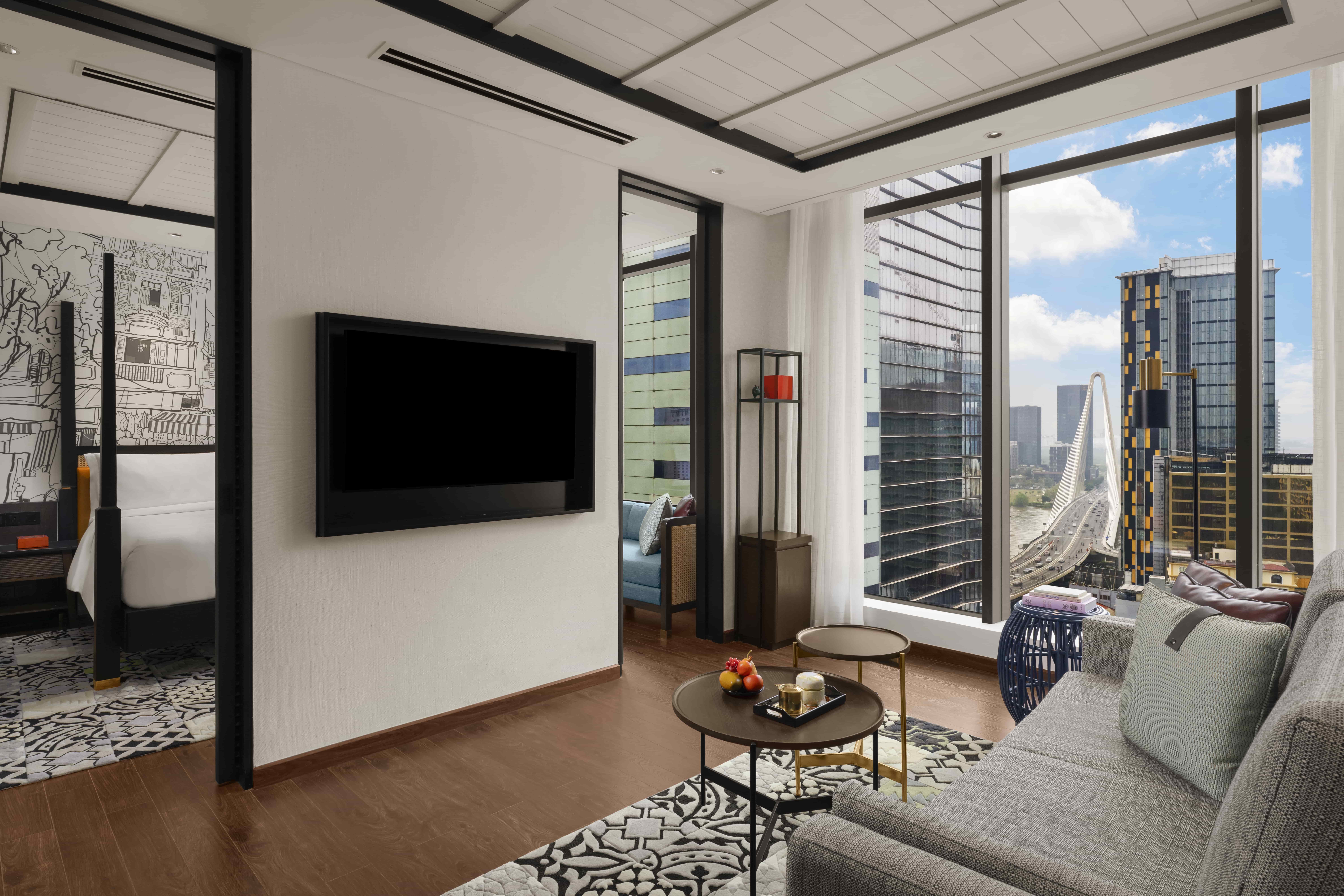 2-one-bedroom-suite-ba-son-bridge-view-living-room-min-1750323781.jpg