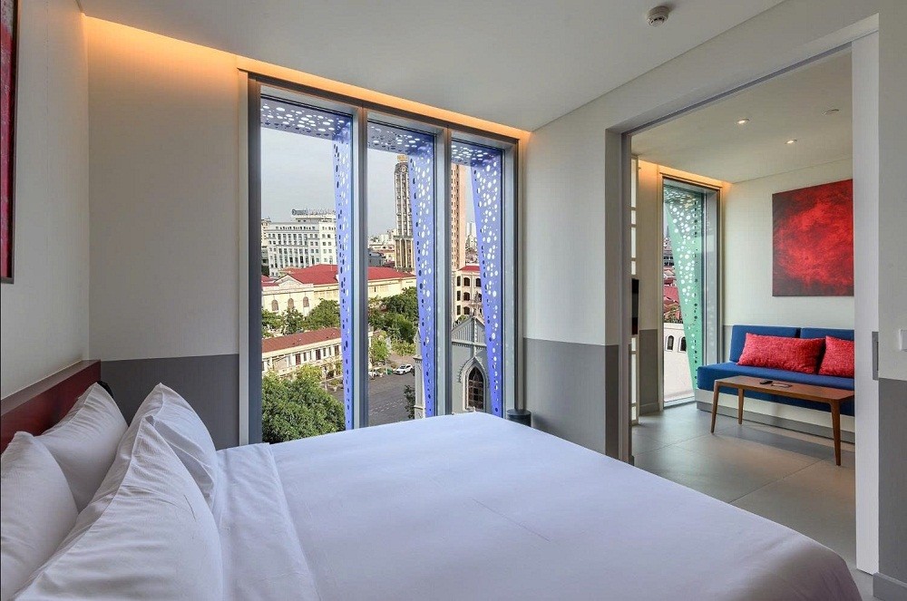 wink-hotel-hai-phong-wink-live-1-bedroom-suite-with-kitchen-and-living-room-can-ho-dich-vu-cua-khach-san-wink-hai-phong-tich-hop-khu-vuc-bep-va-phong-khach-1752846966.jpg